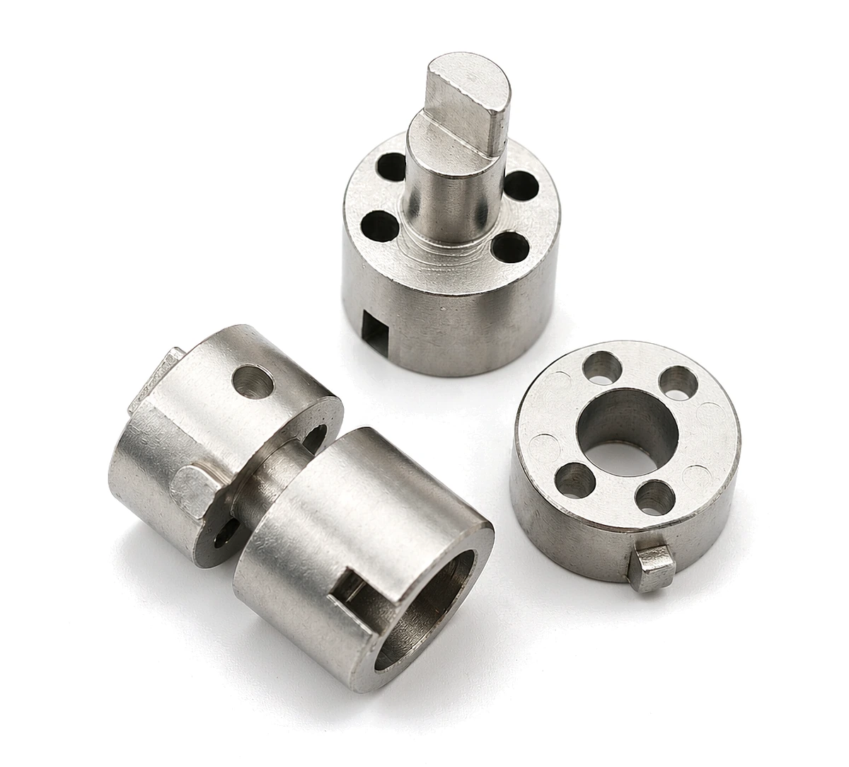 Notebook hinge spindle shafts, barrels and a drilled collar ring in stainless steel